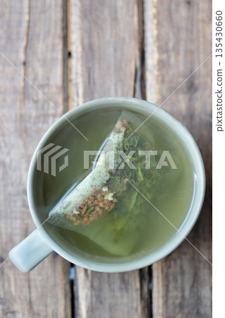 一杯用普通茶包泡製的抹茶味糙米茶。 一杯用普通茶包泡製的抹茶味糙米茶。 135430660