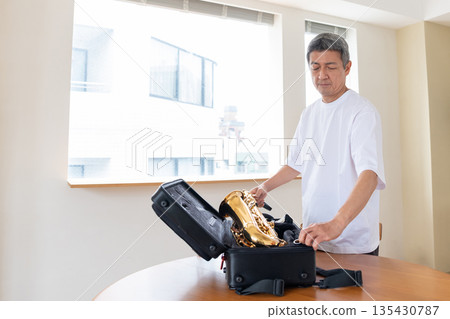 Senior men playing musical instruments Senior men playing musical instruments 135430787