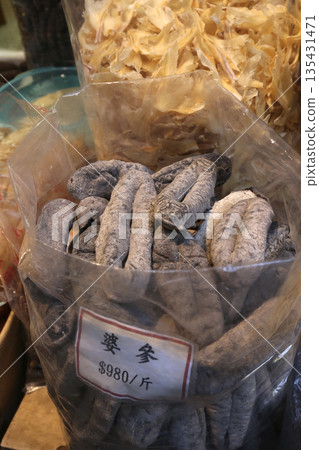 Dried sea cucumber for sale at a dry goods store in Tokufu Dosai, Hong Kong. This Japanese product is particularly expensive 135431471