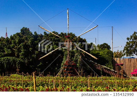 Traditional windmill in garden 135432990