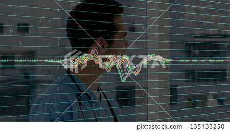 Gazing doctor standing at glass window in clinic corridor, with stethoscope and waveform overlay 135433250