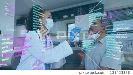 Female healthcare worker in labcoat swabbing senior patient nose in home living room, code overlay 135433328