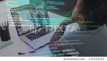 Concentrating man coding on laptop at desk, with code overlay, pencils cable smartphone, copy space Concentrating man coding on laptop at desk, with code overlay, pencils cable smartphone, copy space 135433383