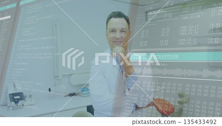 Leaning doctor wearing white coat studying data overlays with instruments, red apple in clinic 135433492