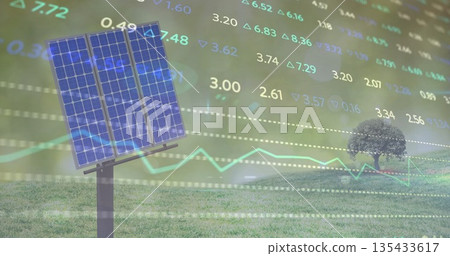 Standing solar panel on pole in field, showing financial data overlay and lone tree, copy space 135433617
