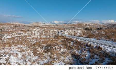 Winter scenery of Akiyoshidai Karst Road and snow-covered grasslands 135433707