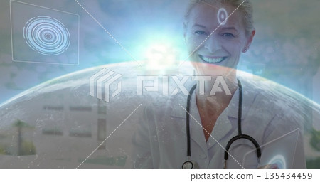 Smiling female doctor presenting interface in clinic, with stethoscope, tablet, globe, copy space Smiling female doctor presenting interface in clinic, with stethoscope, tablet, globe, copy space 135434459