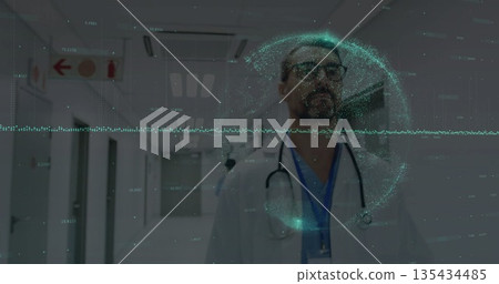 Standing doctor wearing lab coat at hospital corridor with stethoscope and data overlay, copy space Standing doctor wearing lab coat at hospital corridor with stethoscope and data overlay, copy space 135434485