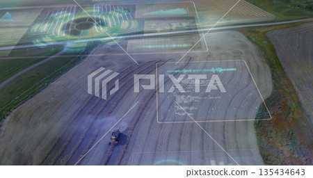 Harvesting combine harvester moving over rural fields with dust plume, AR panels, copy space 135434643