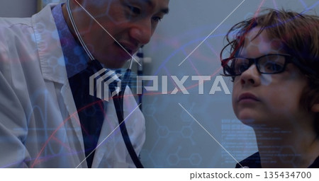Physician wearing white coat using stethoscope examining boy in exam room, DNA overlaying 135434700