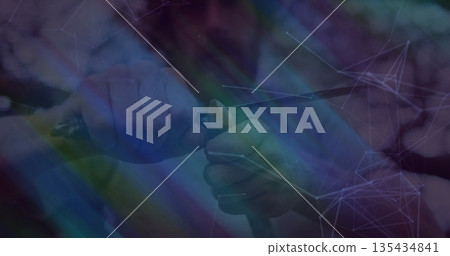 Carving jacket-sleeved hands gripping folding knife and peeling stick in forest, with network lines 135434841