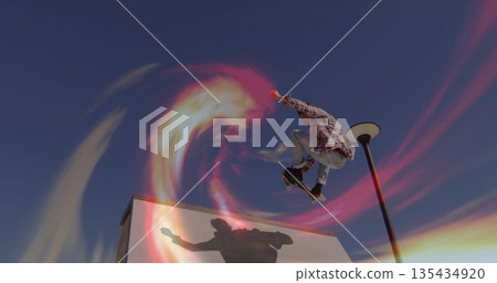Skateboarder jumping off wooden ramp in park, with light trail and streetlamp pole, copy space Skateboarder jumping off wooden ramp in park, with light trail and streetlamp pole, copy space 135434920