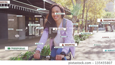 Cycling woman in purple jacket pedaling beside glass building, with smartwatch and floating labels Cycling woman in purple jacket pedaling beside glass building, with smartwatch and floating labels 135435807