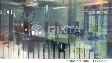 Holding tablet, mature physician analyzing financial charts in office, with stethoscope, copy space Holding tablet, mature physician analyzing financial charts in office, with stethoscope, copy space 135435860
