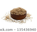 Brown rice in wooden bowl isolated on white background. 135436940