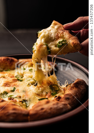 "Pizza with stretchy cheese" 135437306