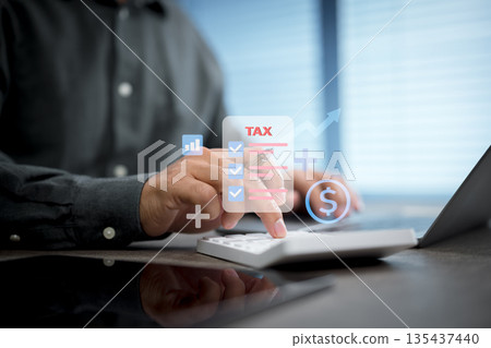 Person using calculator for tax calculation with financial icons overlay 135437440