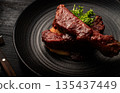 Spare ribs with red wine sauce 135437449