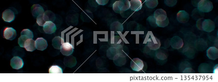 Abstract defocused bokeh lights on dark background Abstract defocused bokeh lights on dark background 135437954
