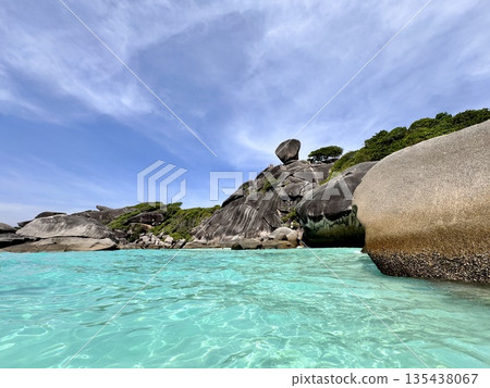 Thailand's Similan Islands, known for their snow-white beaches, crystal clear waters, coral reefs, and rich underwater world Thailand's Similan Islands, known for their snow-white beaches, crystal clear waters, coral reefs, and rich underwater world 135438067