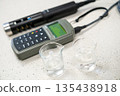 Calibration of a portable pH meter or conductometer for water analysis.  135438918