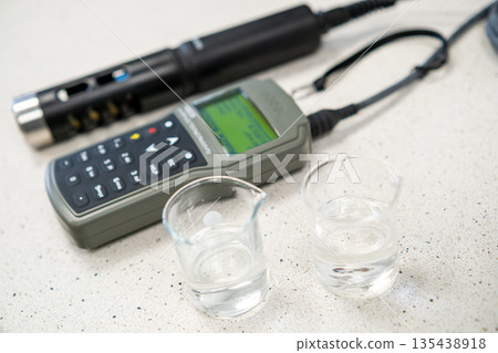 Calibration of a portable pH meter or conductometer for water analysis. Calibration of a portable pH meter or conductometer for water analysis. 135438918