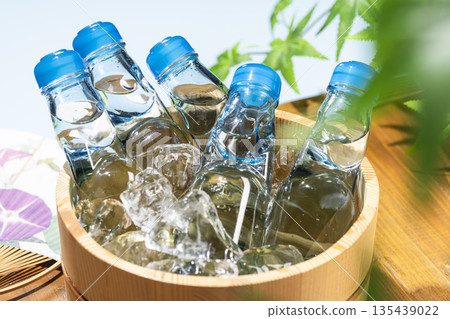 Ramune in a wooden barrel and glass bottle that matches the image of summer Ramune in a wooden barrel and glass bottle that matches the image of summer 135439022