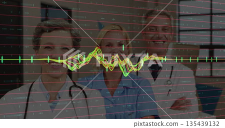 Smiling professionals in white coats, scrubs standing in clinic, with stethoscopes, ECG waveform Smiling professionals in white coats, scrubs standing in clinic, with stethoscopes, ECG waveform 135439132