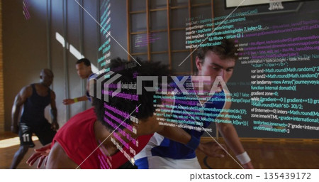 Dribbling basketball male player in red jersey driving toward basket at gym, with code overlay Dribbling basketball male player in red jersey driving toward basket at gym, with code overlay 135439172