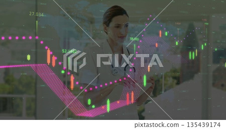 Female doctor reviewing virtual data charts in clinic, with tablet computer and stethoscope Female doctor reviewing virtual data charts in clinic, with tablet computer and stethoscope 135439174