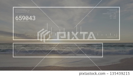Showing seascape displaying waves rolling onto sandy shore at sunrise, with HUD data overlays 135439215