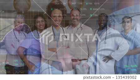 Medical staff standing together in hospital corridor, with digital chart overlay and stethoscopes Medical staff standing together in hospital corridor, with digital chart overlay and stethoscopes 135439302