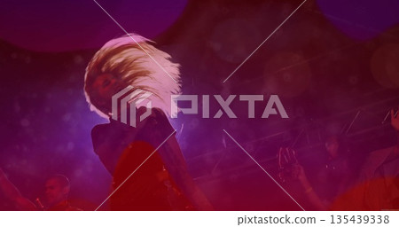 Flipping female performer tossing long blonde hair back on live music stage, with fog, smartphones Flipping female performer tossing long blonde hair back on live music stage, with fog, smartphones 135439338