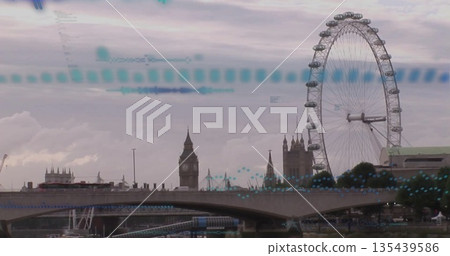 Displaying London Eye wheel hovering above River Thames bridge with blue data overlay 135439586