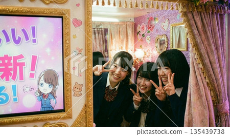 Female students taking Purikura photos 135439738