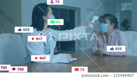 Measuring doctor scanning patient forehead at clinic room wearing masks, thermometer, clipboard Measuring doctor scanning patient forehead at clinic room wearing masks, thermometer, clipboard 135440407