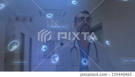Scanning doctor in lab coat and stethoscope exploring holograms in hospital corridor, with panels 135440465
