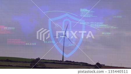 Showing wind turbine scanning data on rural hillside farmland, with digital shield padlock overlay 135440511
