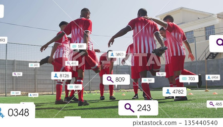 Eight soccer players in red-white jerseys stretching on turf, with orange cones and overlay icons 135440540