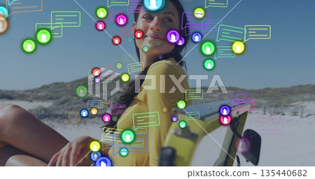 Sitting woman wearing yellow longsleeve top on beach chair on beach, with chat bubbles and avatars Sitting woman wearing yellow longsleeve top on beach chair on beach, with chat bubbles and avatars 135440682