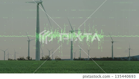 Monitoring large wind turbine spinning on grassy plain, with green waveform and data points Monitoring large wind turbine spinning on grassy plain, with green waveform and data points 135440693