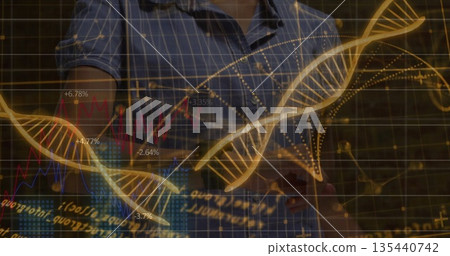 Interacting scientist wearing blue plaid shirt exploring in lab with holographic DNA and graph data 135440742