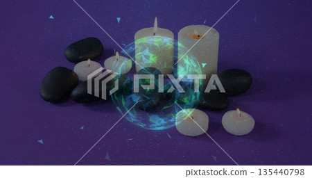 Presenting glowing digital sphere hovering over spa stones on purple table, with white candles Presenting glowing digital sphere hovering over spa stones on purple table, with white candles 135440798