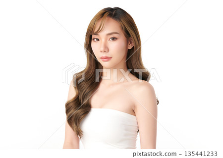 A beautiful young Asian woman with clean, fresh skin against a white background. Skincare, facial treatment, cosmetology, beauty, and spa. An elegant portrait of an Asian woman. A beautiful young Asian woman with clean, fresh skin against a white background. Skincare, facial treatment, cosmetology, beauty, and spa. An elegant portrait of an Asian woman. 135441233