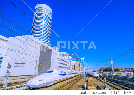 Yokohama cityscape in Japan. Inbound tourism continues... View of the Shinkansen and Yokohama Prince Hotel. A ray of hope for a new era. Yokohama cityscape in Japan. Inbound tourism continues... View of the Shinkansen and Yokohama Prince Hotel. A ray of hope for a new era. 135441689