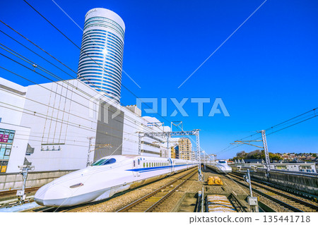 Yokohama cityscape in Japan: Inbound tourism continues... View of the Shinkansen and Yokohama Prince Hotel. A ray of hope for an era of rapid progress. 135441718