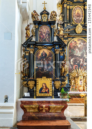 Passau, Germany - Apr 16, 2025: The interior of Parochial Church St Paul, the oldest parish church of Passau, Germany Passau, Germany - Apr 16, 2025: The interior of Parochial Church St Paul, the oldest parish church of Passau, Germany 135441948