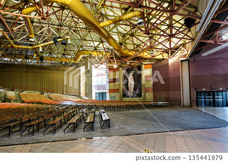 Lourdes, France - Sep 28, 2025: Interior of Saint Bernadette Church in the Sanctuary of Lourdes, France. Lourdes, France - Sep 28, 2025: Interior of Saint Bernadette Church in the Sanctuary of Lourdes, France. 135441979