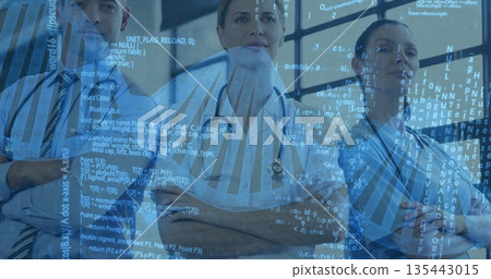 Standing medical team scanning data overlays through grid window in hospital lab, with lab coats Standing medical team scanning data overlays through grid window in hospital lab, with lab coats 135443015