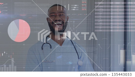Smiling doctor wearing light blue scrubs, stethoscope in clinical corridor, with data overlays Smiling doctor wearing light blue scrubs, stethoscope in clinical corridor, with data overlays 135443033